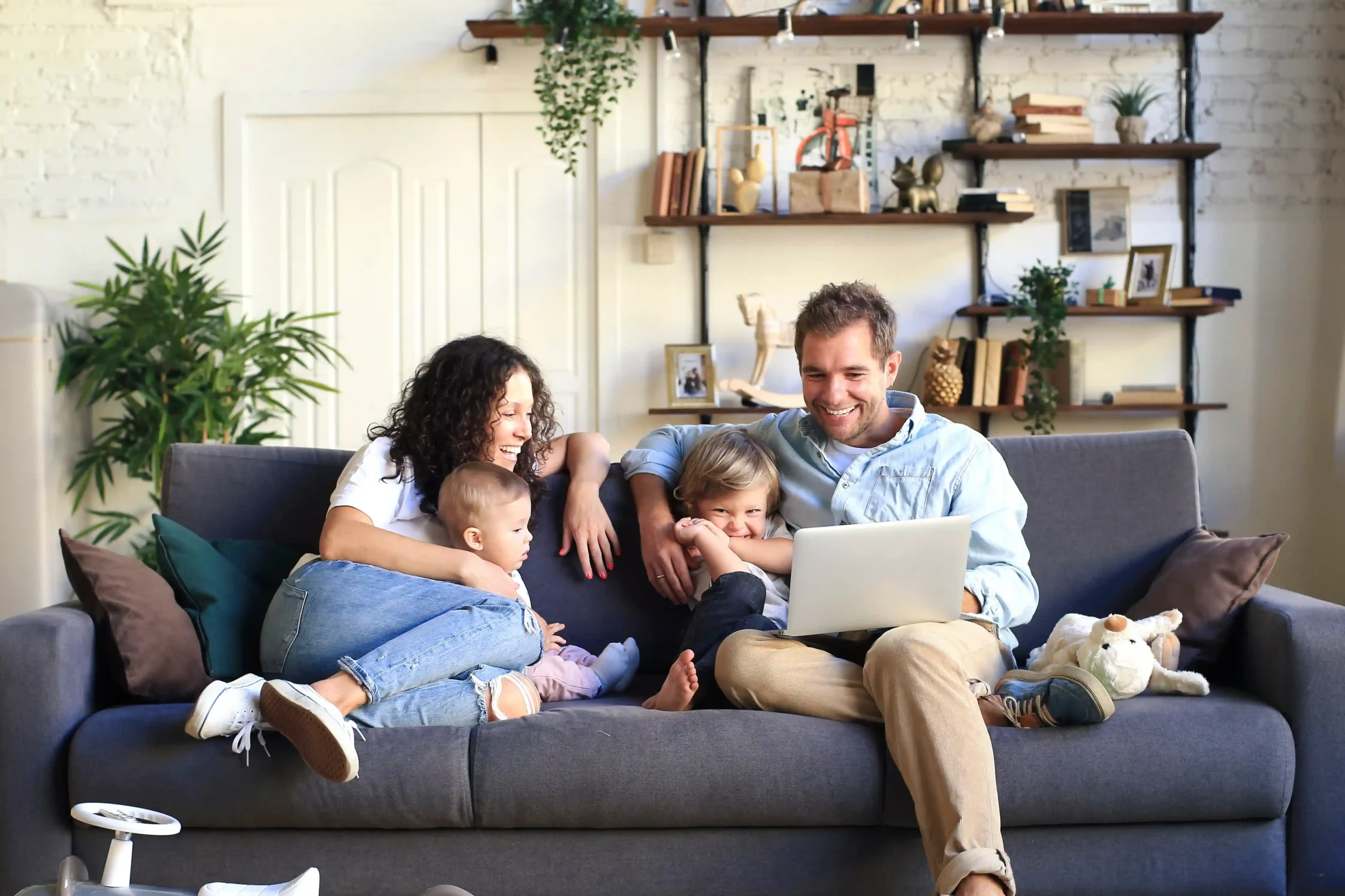 Family reviewing their financial plan together at a computer